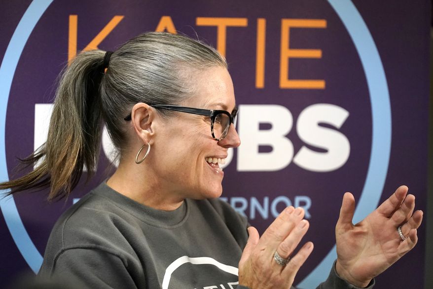 Katie Hobbs, Democratic candidate for Arizona governor, applauds supporters at a campaign event in Peoria, Ariz., Monday, Nov. 7, 2022. (AP Photo/Ross D. Franklin)