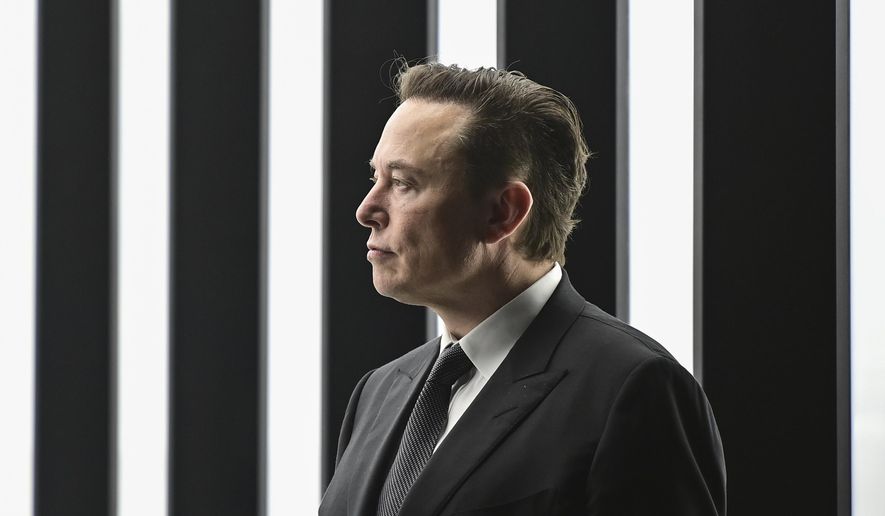 Elon Musk, Tesla CEO, attends the opening of the Tesla factory Berlin Brandenburg in Gruenheide, Germany, March 22, 2022. (Patrick Pleul/Pool via AP, File)