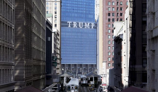The Trump International Hotel and Tower is seen looking north on Wabash Ave. in Chicago&#x27;s famed Loop, on Sept. 17, 2014. A Manhattan judge said Thursday, Nov. 3, 2022, that he will appoint an independent monitor for former President Donald Trump’s real estate empire, restricting his company&#x27;s ability to freely make deals, sell assets and change its corporate structure. (AP Photo/Charles Rex Arbogast, File)
