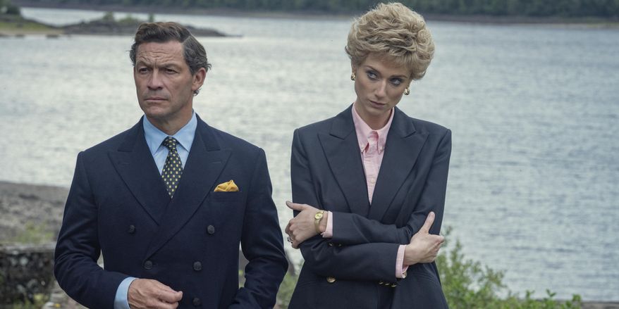 This image released by Netflix shows Dominic West as Prince Charles, left, and Elizabeth Debicki as Princess Diana in a scene from &#x27;The Crown.&amp;quot; (Keith Bernstein/Netflix via AP)