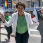 FILE - District of Columbia Mayor Muriel Bowser, center, arrives for a news conference ahead of DC Pride events, June 10, 2022, in Washington. At right is Japer Bowles, director of the Mayor&#39;s Office of Lesbian, Gay, Bisexual, Transgender and Questioning Affairs. (AP Photo/Jacquelyn Martin)
