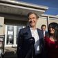 Dr. Mehmet Oz and his wife Lisa Oz exit Bryn Athyn Borough Hall after voting in Huntingdon Valley, Pa., Tuesday, Nov. 8, 2022. (Jessica Griffin/The Philadelphia Inquirer via AP)