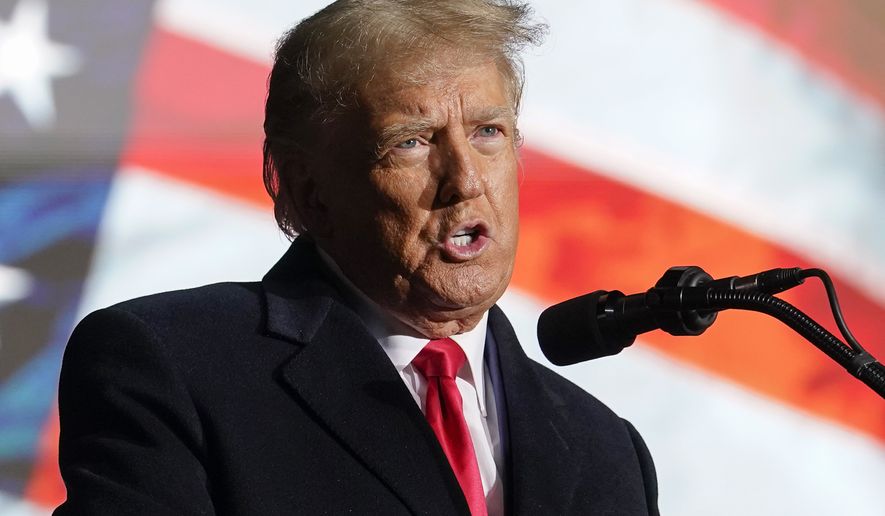 Former President Donald Trump speaks at a campaign rally in support of the campaign of Ohio Senate candidate JD Vance at Wright Bros. Aero Inc. at Dayton International Airport on Monday, Nov. 7, 2022, in Vandalia, Ohio. (AP Photo/Michael Conroy)