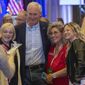 Sen. Ron Johnson, R-Wis., poses for photos with supporters at a election night party in Neenah, Wis., Tuesday, Nov. 8, 2022. (AP Photo/Mike Roemer)