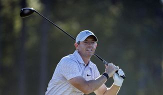 Rory McIlroy, of Northern Ireland, reacts to his drive off the 17th tee during the final round of the CJ Cup golf tournament Sunday, Oct. 23, 2022, in Ridgeland, S.C. (AP Photo/Stephen B. Morton) **FILE**
