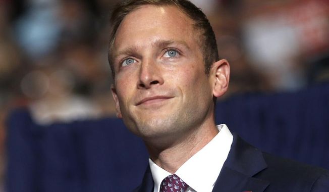 Max Miller, Republican candidate for U.S. Representative for Ohio&#x27;s 7th Congressional District, takes the stage at a campaign rally in Youngstown, Ohio, Sept. 17, 2022. (AP Photo/Tom E. Puskar) **FILE**