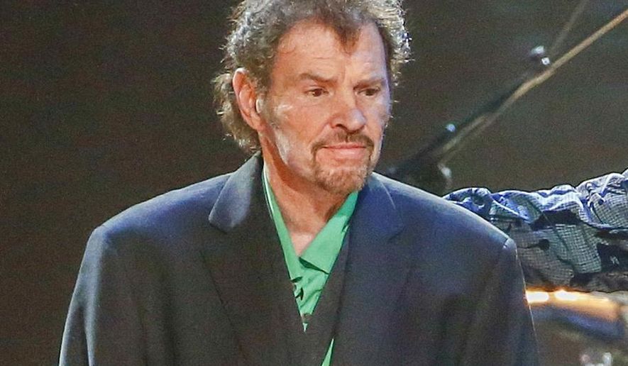 Guitarist and fiddle player Jeff Cook from the band Alabama appears on stage at the concert &quot;Sing me Back Home: The Music of Merle Haggard&quot; in Nashville, Tenn., on April 6, 2017.  Cook died Nov. 7, 2022 at his home in Destin, Fla. He was 73. (Photo by Al Wagner/Invision/AP, File)