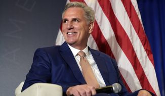 House Minority Leader Kevin McCarthy of Calif., appears on stage before former President Donald Trump speaks at an America First Policy Institute agenda summit in Washington, July 26, 2022. With the promise of a red wave receding, Republicans are facing the stark reality that any return to power would mean presiding over a narrowly split Congress. Meanwhile, McCarthy was weakened by the party&#x27;s dismal performance as he reaches for the speaker&#x27;s gavel(AP Photo/Andrew Harnik, File)