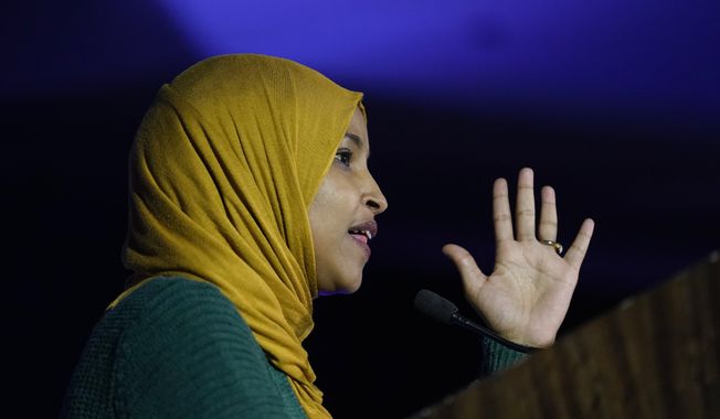 U.S. Rep. Ilhan Omar, D-Minn., speaks to the crowd at the Minnesota Democratic Farmer Labor Party&#x27;s election night party after winning reelection early Wednesday morning, Nov. 9, 2022, in St. Paul, Minn. (AP Photo/Abbie Parr) **FILE**