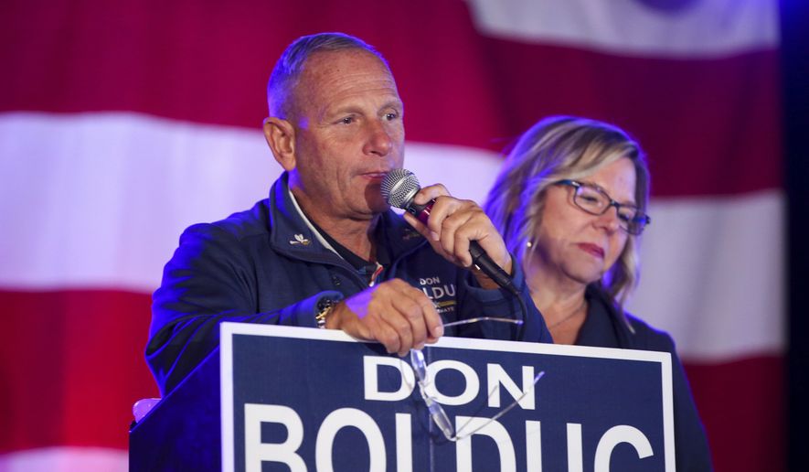 New Hampshire Republican Senate candidate Don Bolduc, with wife Sharon, concedes the election to incumbent Sen. Maggie Hassan, D-N.H., Tuesday Nov. 8, 2022, in Manchester, N.H. (AP Photo/Reba Saldanha)