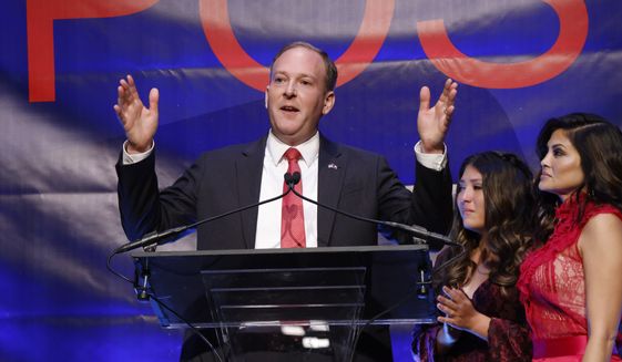 Republican gubernatorial candidate Lee Zeldin is joined by family as he addresses supporters at his election night party, just after midnight on Wednesday, Nov. 9, 2022, in New York. (AP Photo/Jason DeCrow)