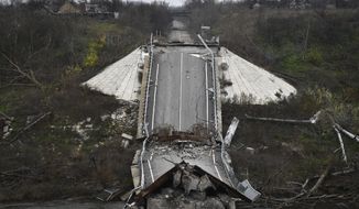 A destroyed bridge across Siverskyi-Donets river is seen in the recently recaptured village of Zakitne, Ukraine, Wednesday, Nov. 9, 2022. Villages and towns in Ukraine saw more heavy fighting and shelling Wednesday as Ukrainian and Russian forces strained to advance on different fronts after more than 8 1/2 months of war. At least nine civilians were killed and 24 others were wounded in 24 hours, the Ukrainian president&#39;s office said. (AP Photo/Andriy Andriyenko)