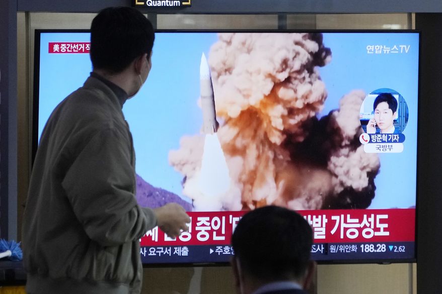 A TV screen shows a file image of North Korea&#x27;s missile launch during a news program at the Seoul Railway Station in Seoul, South Korea, Wednesday, Nov. 9, 2022. (AP Photo/Ahn Young-joon) ** FILE **