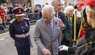Britain&#39;s King Charles III reacts after an egg was thrown his direction as he arrived for a ceremony at Micklegate Bar, where the Sovereign is traditionally welcomed to the city, in York, England, Wednesday Nov. 9, 2022. (James Glossop/Pool Photo via AP)