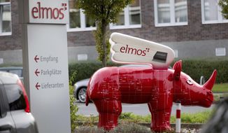 FILE - A winged &#39;Elmos rhinoceros&#39; stands in front of the chip factory Elmos Semiconductor SE offices in Dortmund, Germany, on Nov. 8, 2022. China&#39;s government on Wednesday, Nov. 9, appealed to Germany to maintain access to its markets after the company said Berlin may block the sale of a computer chip factory to a Chinese-owned buyer amid tensions over technology and security. (Dieter Menne/dpa via AP, File)