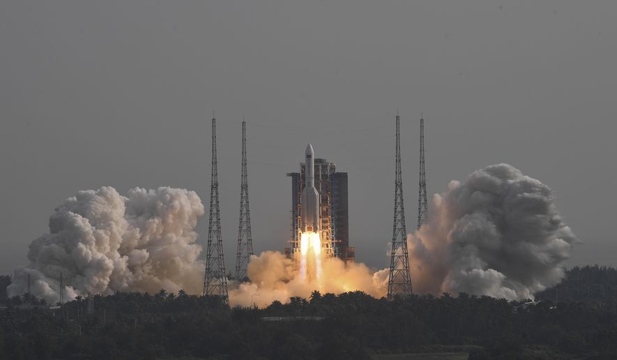 In this photo released by Xinhua News Agency, the Long March-5B Y4 carrier rocket carrying the space lab module Mengtian blasts off from the Wenchang Satellite Launch Center in south China&#x27;s Hainan Province on Oct. 31, 2022. Philippine officials said Wednesday, Nov. 9, 2022, suspected debris from a recent Chinese rocket launch has been found at sea off two provinces and they were pressing efforts for Manila to ratify two U.N. treaties that allow people to seek compensation for damage or injury from space launches. (Hu Zhixuan/Xinhua via AP, File)