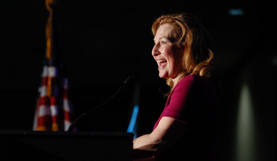 Rep. Kim Schrier addresses gathered supporters at the Democratic election party on Tuesday, Nov. 8, 2022, in Bellevue, Wash. (Jennifer Buchanan/The Seattle Times via AP)