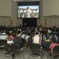 Members of the Zo language-speaking community in the Dallas-Fort Worth, Texas, area view the &quot;Jesus&quot; film premiere in their own language, the 2,000th language into which this movie telling of the life of Christ has been translated. (Photo courtesy of Cru)
