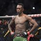 Israel Adesanya prepares to fight Jared Cannonier in a middleweight title bout during the UFC 276 mixed martial arts event Saturday, July 2, 2022, in Las Vegas. Adesanya has lost twice before to Alex Pereira, only in their old careers as kickboxers. Adesanya has since become one of UFC&#39;s best fighters and puts his middleweight title on the line against Pereira in the main event of UFC 281 Saturday, Nov. 12 at Madison Square Garden. (AP Photo/John Locher, File)