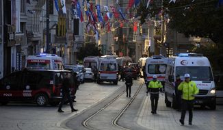 Police vehicles and ambulances are parked at the site of an explosion on Istanbul&#39;s popular pedestrian Istiklal Avenue in Istanbul, Turkey, Sunday, Nov. 13, 2022. Istanbul Gov. Ali Yerlikaya tweeted that the explosion occurred at about 4:20 p.m. (1320 GMT) and that there were deaths and injuries, but he did not say how many. The cause of the explosion was not clear. (AP Photo/Francisco Seco)
