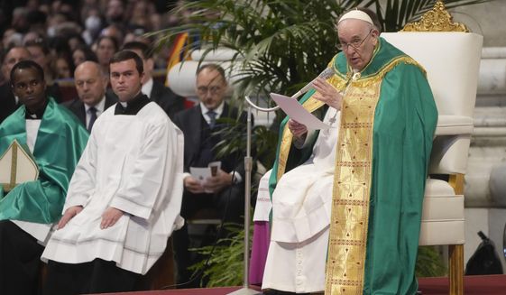 Pope Francis delivers his message as he celebrates a mass on the occasion of the World Day of the Poor in St. Peter&#39;s Basilica, at the Vatican, Sunday, Nov. 13, 2022. (AP Photo/Gregorio Borgia)