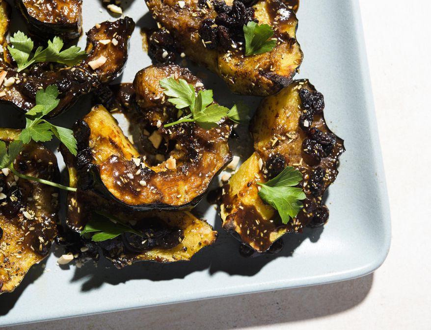This image released by Milk Street shows a recipe for Agrodolce Acorn. (Milk Street via AP)