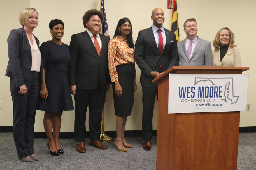 Maryland Gov.-elect Wes Moore, third from right, stands with key members of his administration&#x27;s leadership team, which he announced during a news conference on Monday, Nov. 14, 2022 in Annapolis, Md. (AP Photo/Brian Witte)
