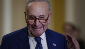Senate Majority Leader Chuck Schumer, D-N.Y., smiles as he speaks to reporters following a closed-door policy meeting on the Democrats&#39; lame duck agenda, at the Capitol in Washington, Tuesday, Nov. 15, 2022. (AP Photo/J. Scott Applewhite)