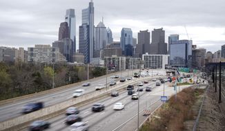 Traffic moves along the Interstate 76 highway on March 31, 2021, in Philadelphia. AP Photo/Matt Rourke, File)