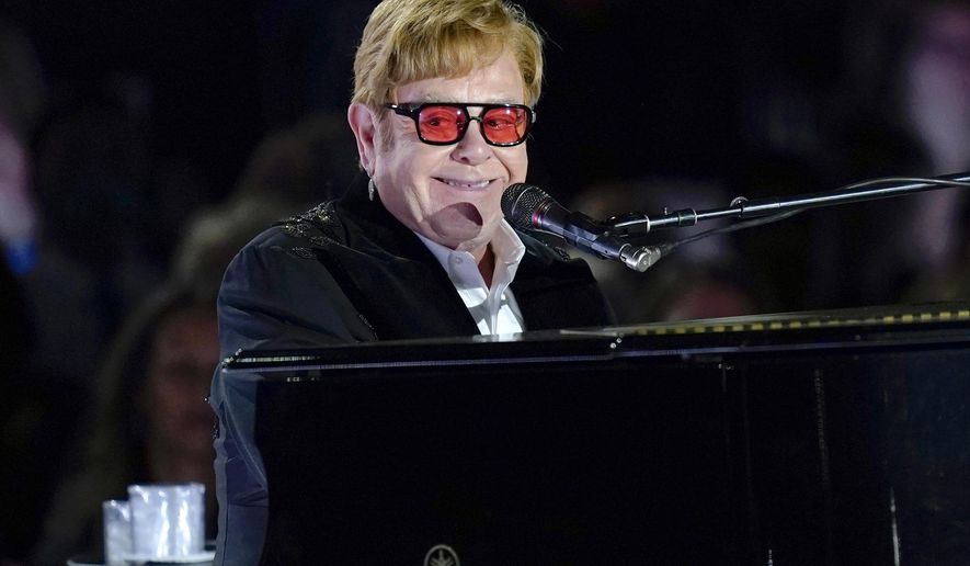 FILE - Elton John performs on the South Lawn of the White House in Washington, Friday, Sept. 23, 2022. Elton John is ending the North American leg of his farewell concert tour at L.A.s Dodger Stadium. His three shows start Thursday. The final one, on Sunday, will be shown as a livestream on Disney+. (AP Photo/Susan Walsh, File)