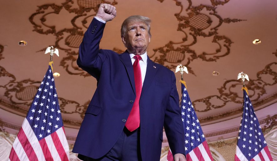 Former President Donald Trump gestures after announcing he is running for president for the third time as he speaks at Mar-a-Lago in Palm Beach, Fla., Tuesday, Nov. 15, 2022. (AP Photo/Andrew Harnik)
