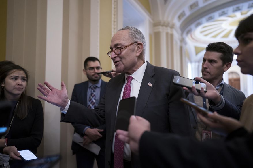 Senate Majority Leader Chuck Schumer, D-N.Y., speaks with reporters before Senate Democrats move ahead with legislation to protect same-sex and interracial marriage, at the Capitol in Washington, Wednesday, Nov. 16, 2022. (AP Photo/J. Scott Applewhite)