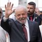 Brazilian President-elect Luiz Inacio Lula da Silva waves as he arrives at the COP27 U.N. Climate Summit, Wednesday, Nov. 16, 2022, in Sharm el-Sheikh, Egypt. (AP Photo/Peter Dejong)