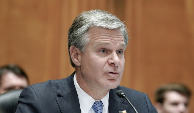 FBI Director Christopher A. Wray testifies during a Senate Homeland Security Committee hearing on threats to the homeland on Capitol Hill in Washington, Thursday, Nov. 17, 2022. (AP Photo/Mariam Zuhaib)