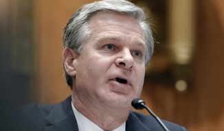 FBI director Christopher Wray testifies during a Senate Homeland Security Committee hearing on threats to the homeland on Capitol Hill in Washington, Thursday, Nov. 17, 2022. (AP Photo/Mariam Zuhaib)
