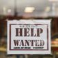 A help wanted sign is displayed in a storefront, Tuesday, Nov. 1, 2022, in Bedford, N.Y.  The U.S. job market remains healthy, Thursday, Nov. 17,  as fewer Americans applied for unemployment benefits last week, despite the Federal Reserve’s rapid interest rate hikes this year intended to bring down inflation and tighten the labor market.  (AP Photo/Julia Nikhinson, File)