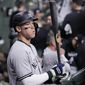 New York Yankees Aaron Judge stands in the dugout ahead of Game 1 of baseball&#39;s American League Championship Series between the Houston Astros and the New York Yankees, Wednesday, Oct. 19, 2022, in Houston. (AP Photo/Kevin M. Cox)