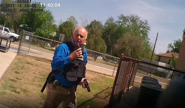 This image from video released by the City of Uvalde, Texas shows city police Lt. Mariano Pargas responding to a shooting at Robb Elementary School, on May 24, 2022 in Uvalde, Texas. Pargas was the acting chief for the city on the day of the shooting and was placed on administrative leave in July. (City of Uvalde via AP)