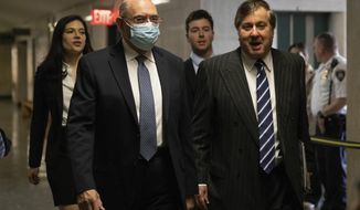Trump Organization&#39;s former Chief Financial Officer Allen Weisselberg, left, arrives to the courtroom in New York, Thursday, Nov. 17, 2022. (AP Photo/Yuki Iwamura)