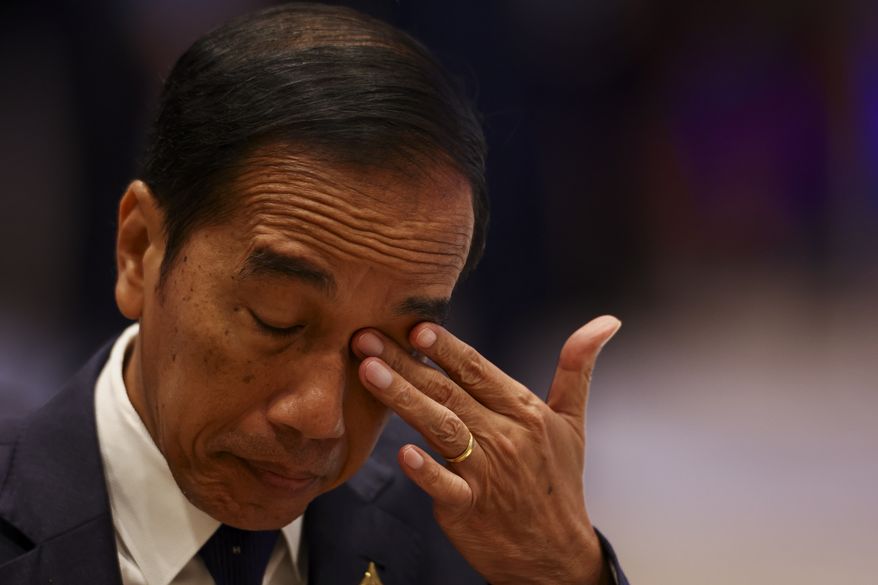 Indonesia&#x27;s President Joko Widodo attends an APEC Leaders&#x27; Informal Dialogue with Guests during the Asia-Pacific Economic Cooperation (APEC) Summit in Bangkok, Thailand Friday, Nov. 18, 2022. (Athit Perawongmetha/Pool Photo via AP)