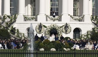 President Joe Biden&#39;s granddaughter Naomi Biden and her fiance, Peter Neal, are married on the South Lawn of the White House in Washington, Saturday, Nov. 19, 2022. (AP Photo/Carolyn Kaster)