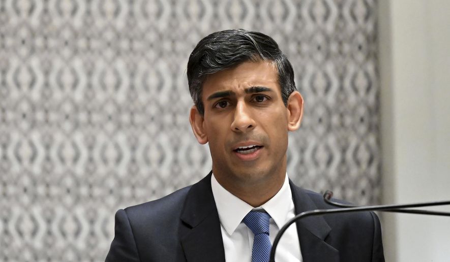 British Prime Minister Rishi Sunak holds a press conference after meeting with U.S. President Joe Biden and a phone call to Ukraine President Volodymyr Zelenskyy, Wednesday, Nov. 16, 2022, in Nusa Dua, Indonesia. (Leon Neal/Pool Photo via AP)