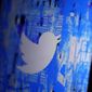 The Twitter splash page is seen on a digital device, Monday, April 25, 2022, in San Diego. (AP Photo/Gregory Bull, File)