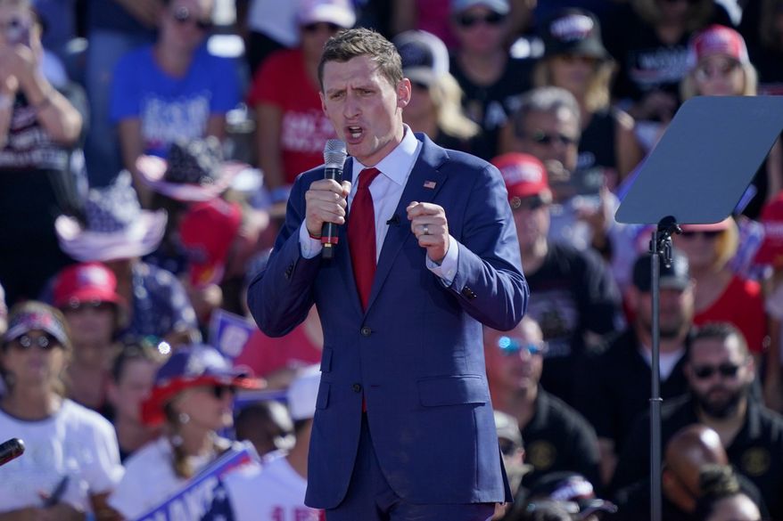 Senate Republican candidate Blake Masters speaks at a rally, Sunday, Oct. 9, 2022, in Mesa, Ariz. Masters lost his race against Democratic Sen. Mark Kelly. (AP Photo/Matt York) **FILE**