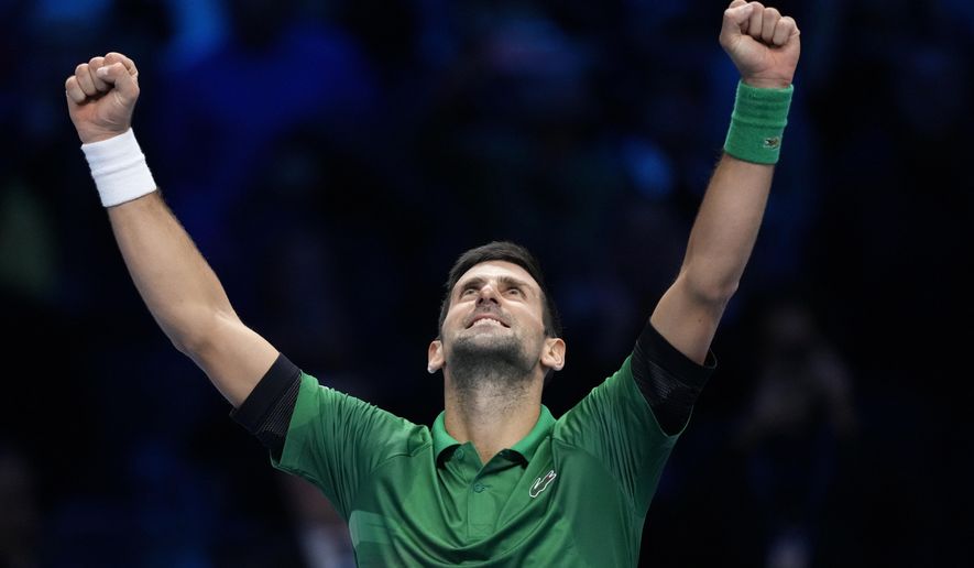 Serbia&#x27;s Novak Djokovic celebrates after defeating Norway&#x27;s Casper Ruud 7-5, 6-3, in their singles final tennis match of the ATP World Tour Finals at the Pala Alpitour, in Turin, Italy, Sunday, Nov. 20, 2022. (AP Photo/Antonio Calanni)