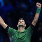 Serbia&#39;s Novak Djokovic celebrates after defeating Norway&#39;s Casper Ruud 7-5, 6-3, in their singles final tennis match of the ATP World Tour Finals at the Pala Alpitour, in Turin, Italy, Sunday, Nov. 20, 2022. (AP Photo/Antonio Calanni)