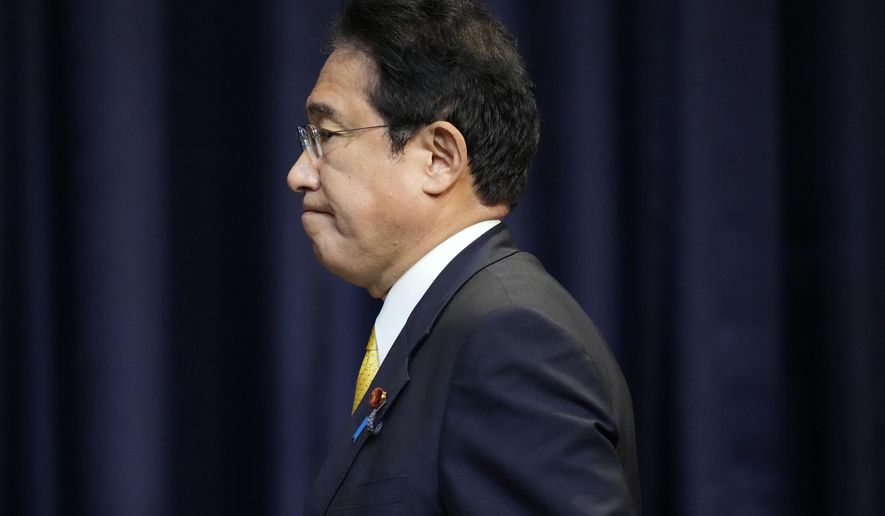 Japan&#x27;s Prime Minister Fumio Kishida arrives for a press conference in Bangkok, Thailand, on the sidelines of the Asia-Pacific Economic Cooperation, APEC summit, Saturday, Nov. 19, 2022. (AP Photo/Sakchai Lalit)