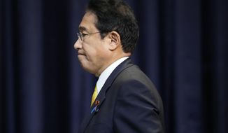 Japan&#39;s Prime Minister Fumio Kishida arrives for a press conference in Bangkok, Thailand, on the sidelines of the Asia-Pacific Economic Cooperation, APEC summit, Saturday, Nov. 19, 2022. (AP Photo/Sakchai Lalit)