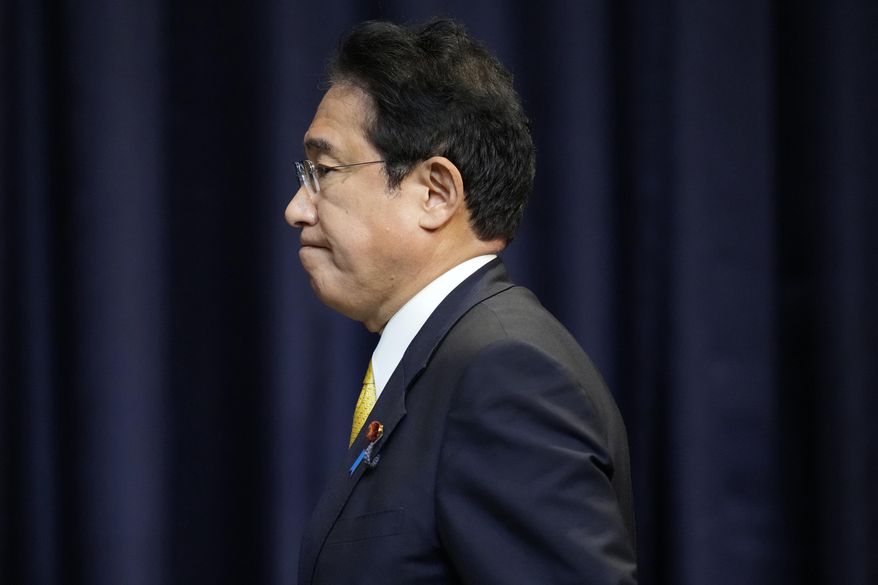 Japan&#x27;s Prime Minister Fumio Kishida arrives for a press conference in Bangkok, Thailand, on the sidelines of the Asia-Pacific Economic Cooperation, APEC summit, Saturday, Nov. 19, 2022. (AP Photo/Sakchai Lalit)