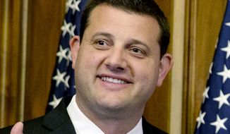 U.S. Rep. David Valadao, R-Calif., poses during a ceremonial re-enactment of his swearing-in ceremony in the Rayburn Room on Capitol Hill in Washington on Jan. 6, 2015. Valadao is seeking reelection to California&#39;s 22nd Congressional District seat in the Nov. 8, 2022 election. (AP Photo/Jacquelyn Martin, File)